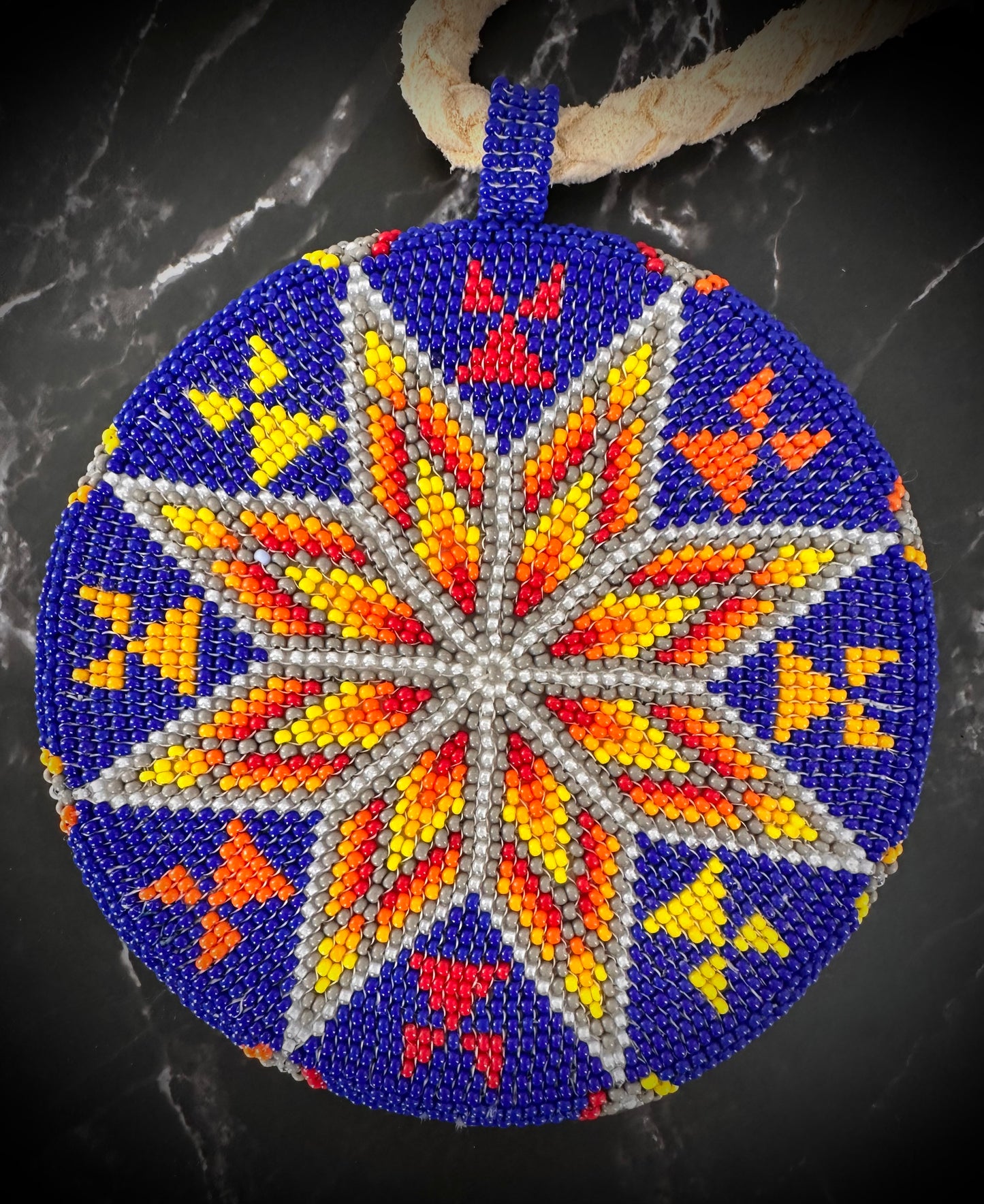 Radiant Horizon Beaded Medallion: A Burst of Color