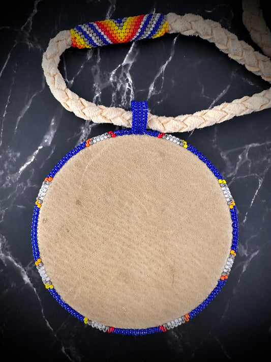 Radiant Horizon Beaded Medallion: A Burst of Color