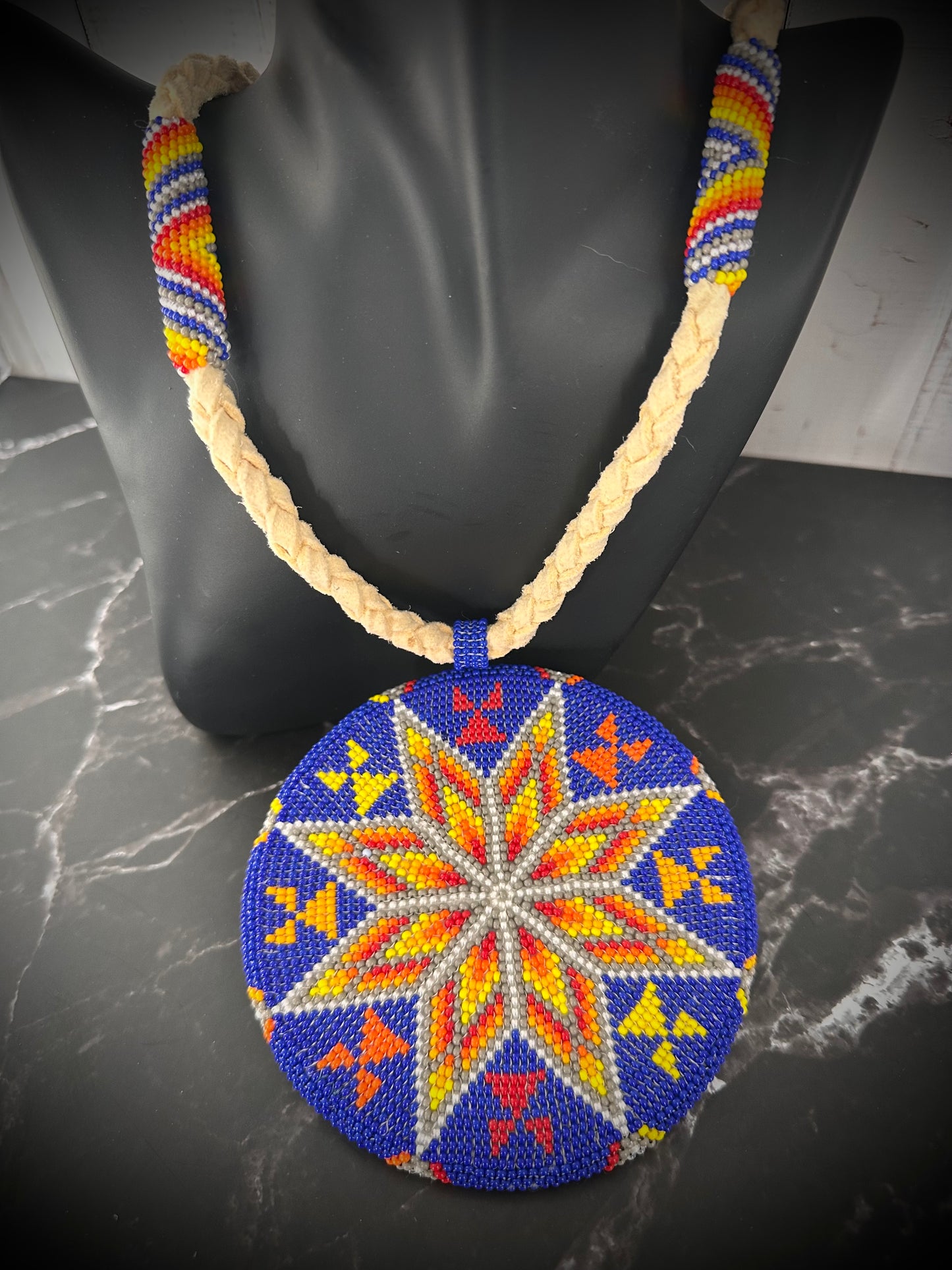 Radiant Horizon Beaded Medallion: A Burst of Color