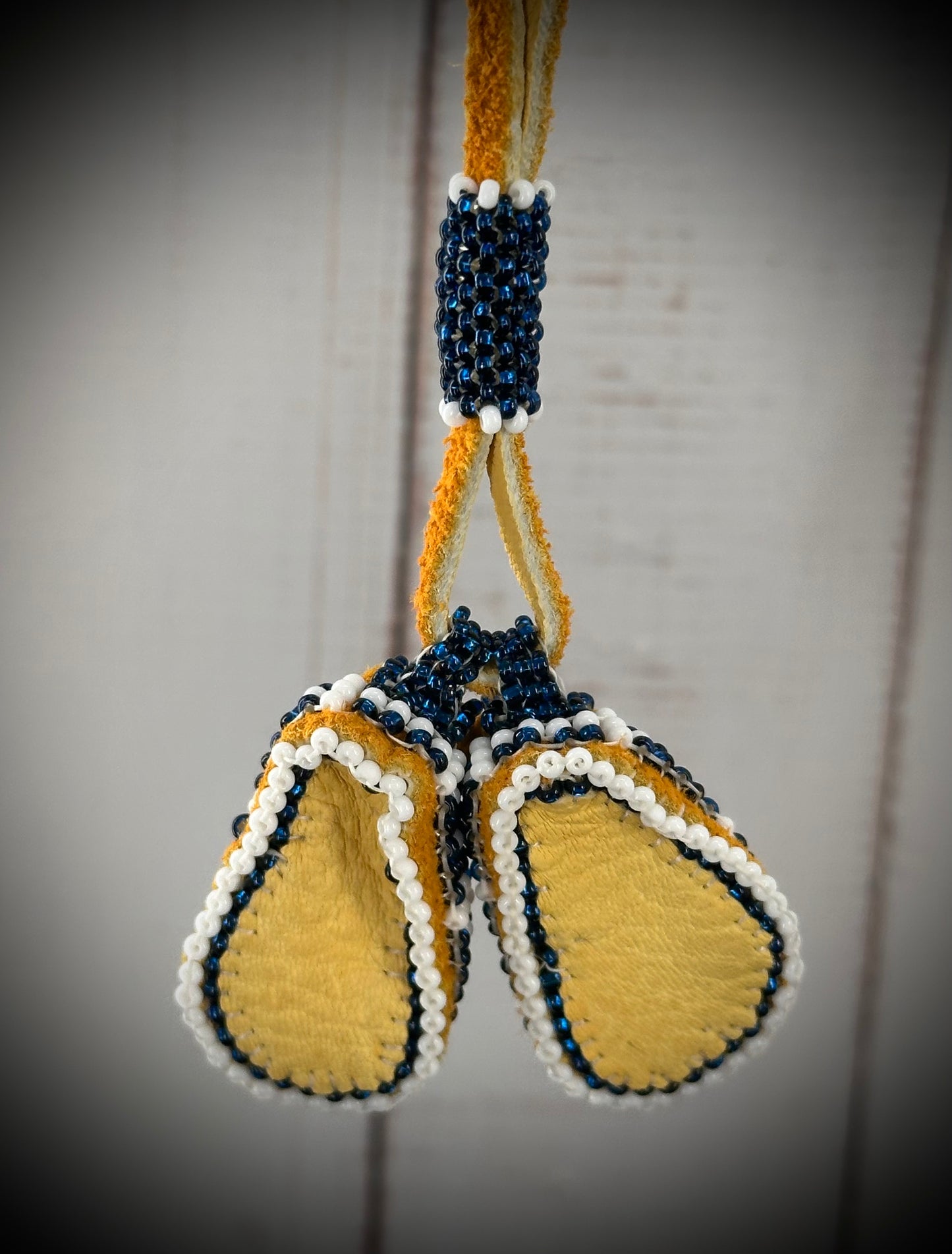 Tiny Treasures: Unique Beaded Moccasin Necklace