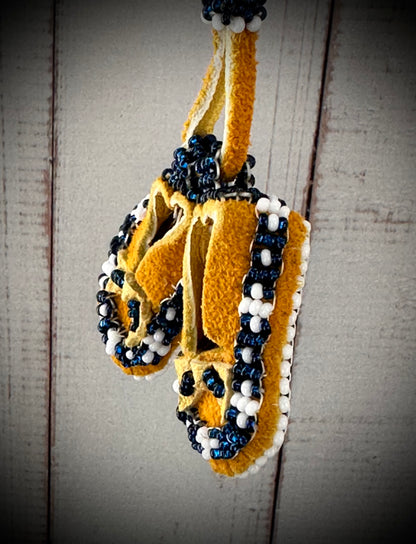 Tiny Treasures: Unique Beaded Moccasin Necklace